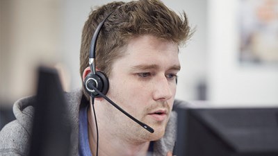 Man on a call for the NSPCC helpline