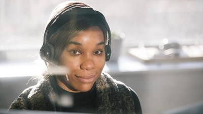 A member of the NSPCC Helpline team taking a call.