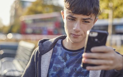 Boy looking at phone