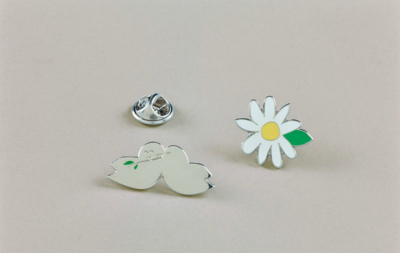 NSPCC daisy and dove pin badges