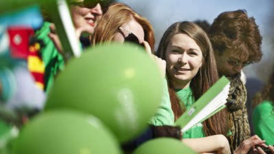 Woman in NSPCC vest smiling