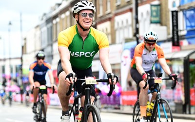 A man riding in a cycle race