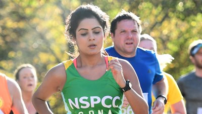 A woman running in the Royal Parks race
