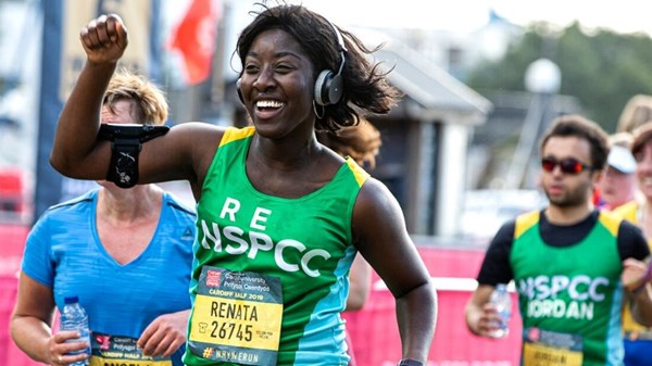 A woman running in a half marathon
