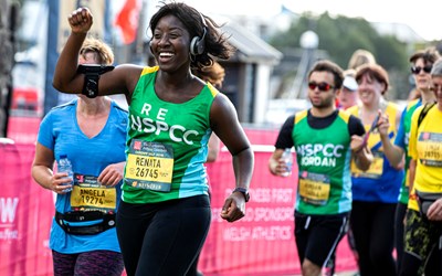 A woman running in a half marathon