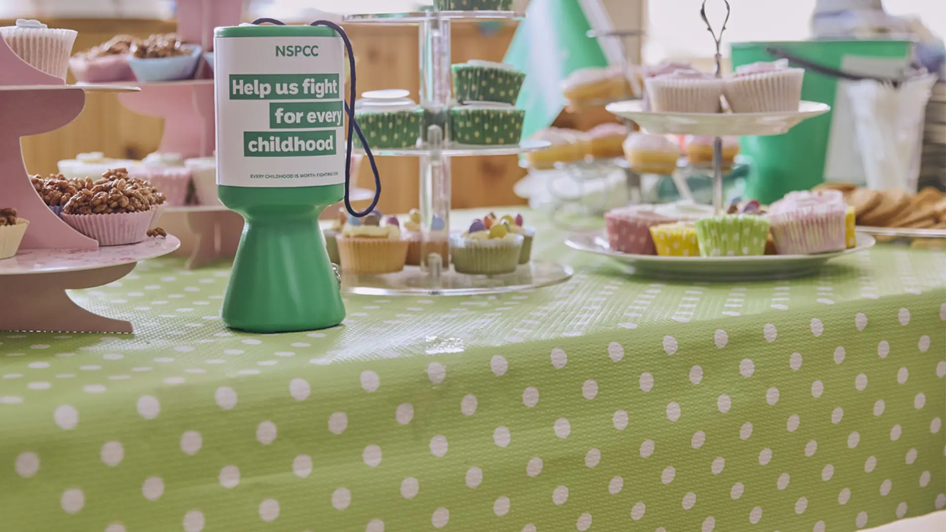 A table full of cakes for a bake sale