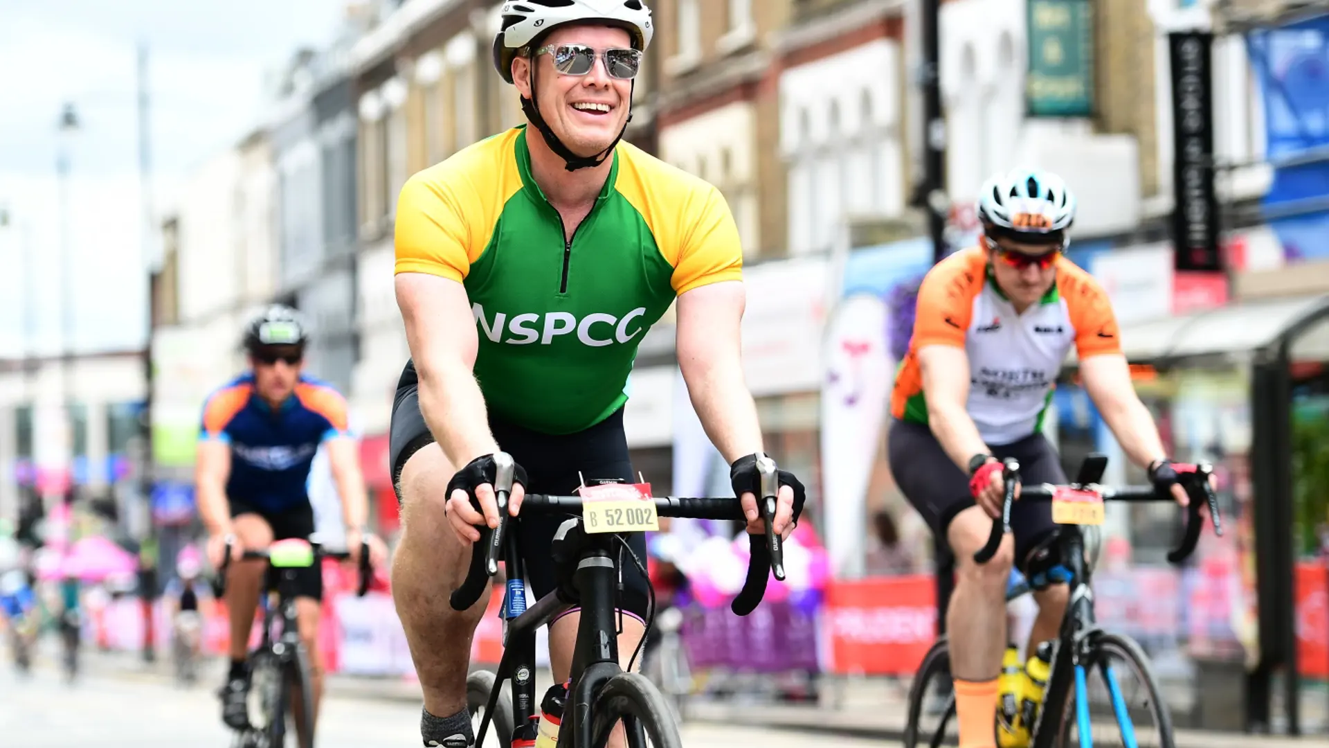 A man riding in a cycle race